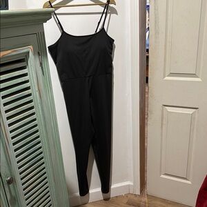 Black Spaghetti Strap Jumpsuit with Fitted Bodice and Tapered Ankles